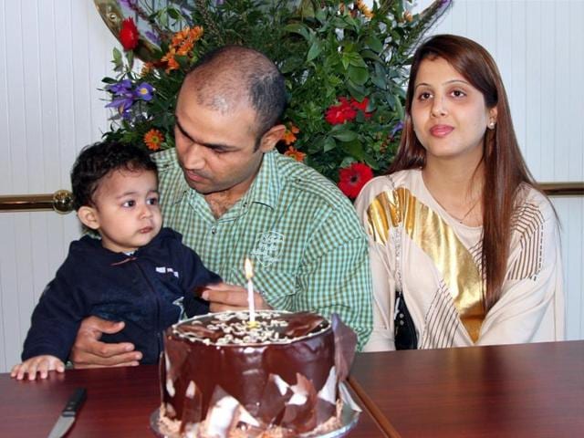 Virender Sehwag celebrates his wedding anniversary with his wife Aarti and their son in Durban, South Africa, on April 24, 2009. (PTI) 