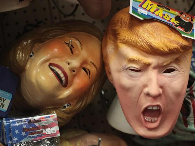 Masks depicting presidential nominees Donald Trump and Hillary Clinton are offered for sale at Fantasy Costumes in Chicago, Illinois. (AFP Photo) Masks depicting presidential nominees Donald Trump and Hillary Clinton are offered for sale at Fantasy Costumes in Chicago, Illinois. (AFP Photo)