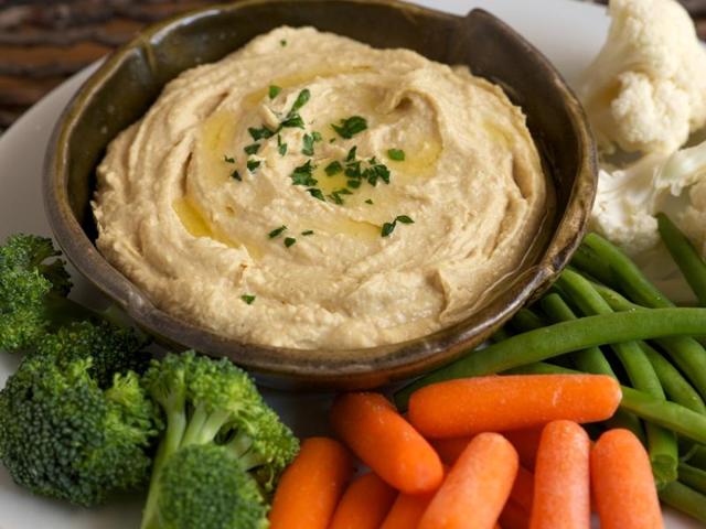 Raw vegetables with hummus: Raw, pre-washed and prepped vegetables are snacks you can always feel good about. Carrots and cucumbers, contain life-enhancing enzymes, which are destroyed when cooked and processed. Enzymes are essential for optimum digestion, metabolism and absorption. They also help in avoiding afternoon grogginess. Snack on carrots, cucumber, broccoli florets and celery sticks with hummus. (Shutterstock) Raw vegetables with hummus: Raw, pre-washed and prepped vegetables are snacks you can always feel good about. Carrots and cucumbers, contain life-enhancing enzymes, which are destroyed when cooked and processed. Enzymes are essential for optimum digestion, metabolism and absorption. They also help in avoiding afternoon grogginess. Snack on carrots, cucumber, broccoli florets and celery sticks with hummus. (Shutterstock)