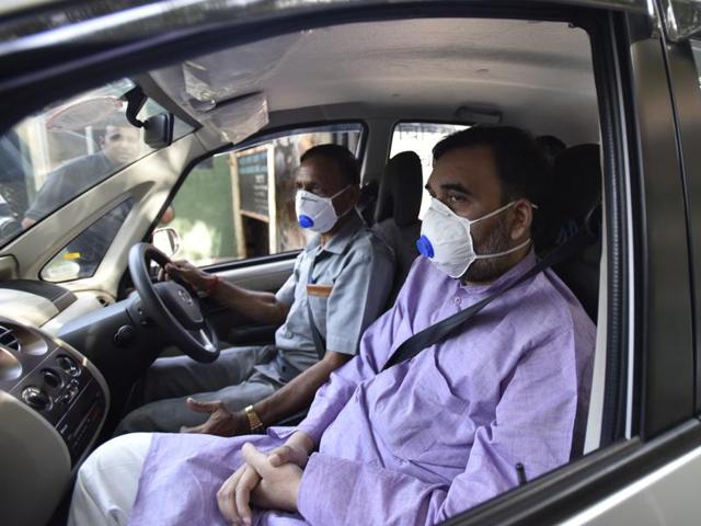 Delhi’s development minister Gopal Rai exits the Delhi Zoo wearing a protective face mask. (Virendra Singh Gosain/HT PHOTO)