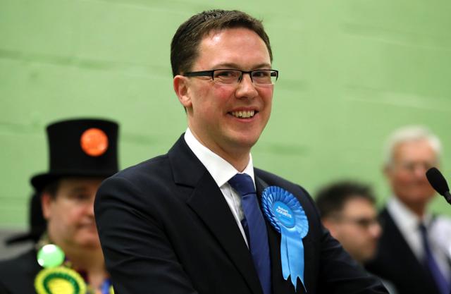 Conservative candidate Robert Courts makes a speech after winning the Witney by-election on Friday. The Conservative Party retained the seat in Parliament vacated by former premier David Cameron but with a sharply reduced majority. (AP) Conservative candidate Robert Courts makes a speech after winning the Witney by-election on Friday. The Conservative Party retained the seat in Parliament vacated by former premier David Cameron but with a sharply reduced majority. (AP)