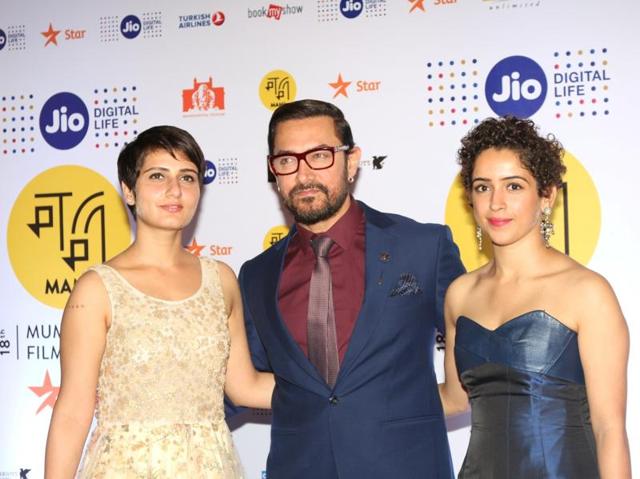 Actors Fatima Sana Shaikh and Sanya Malhotra with Aamir Khan during the opening ceremony of MAMI 18th Mumbai Film Festival. (IANS Photo)