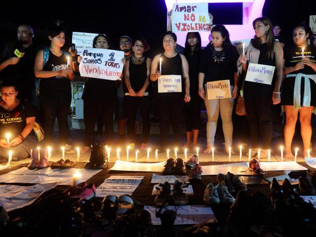 Activists take part in a demonstration to protest violence against women and in favour of the decriminalization of the abortion at the Constitution monument in San Salvador,Wednesday. The killing, in which the high school student was allegedly raped and impaled on a spike by drug dealers, is just the latest incident of horrific gender violence in Argentina, which has seen more than a year of mass marches to protest brutality against women. (AFP) Activists take part in a demonstration to protest violence against women and in favour of the decriminalization of the abortion at the Constitution monument in San Salvador,Wednesday. The killing, in which the high school student was allegedly raped and impaled on a spike by drug dealers, is just the latest incident of horrific gender violence in Argentina, which has seen more than a year of mass marches to protest brutality against women. (AFP)