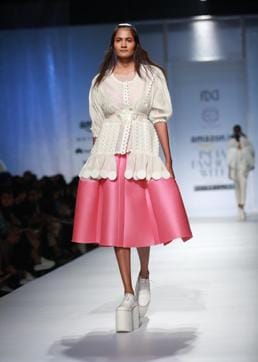 A model rocks the pleated midi skirt by designer Amit Aggarwal. (AMAL KS /HINDUSTAN TIMES)