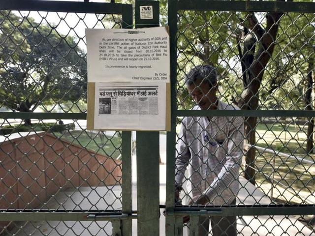 A banner placed at the main gate of Deer Park, Hauz Khas Village. (Arun Sharma/HT PHOTO)