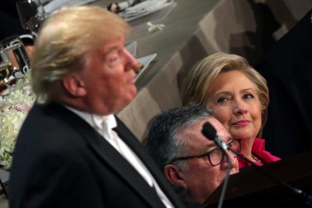 Democratic US presidential nominee Hillary Clinton looks at Donald Trump during the Alfred E. Smith Memorial Foundation dinner. (Reuters Photo) Democratic US presidential nominee Hillary Clinton looks at Donald Trump during the Alfred E. Smith Memorial Foundation dinner. (Reuters Photo)