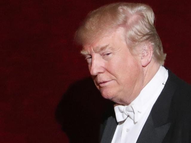 Donald Trump walks onto the stage while attending the annual Alfred E Smith Memorial Foundation Dinner at the Waldorf Astoria in New York City.(AFP Photo)