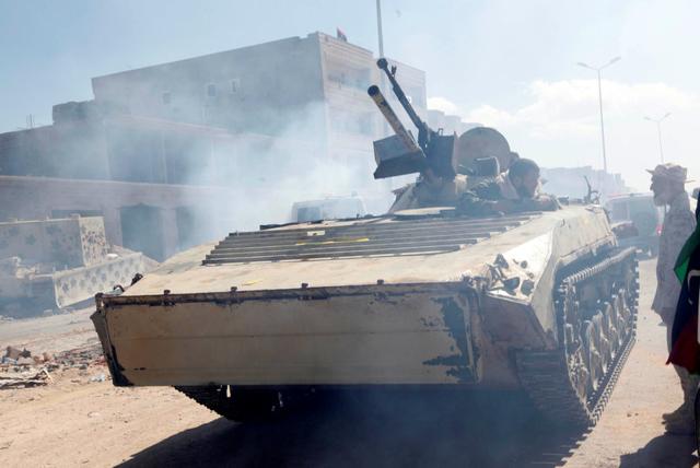 A fighter of Libyan forces allied with the U.N.-backed government speaks with his comrade as he sits in a military vehicle at the eastern frontline of fighting with Islamic State militants, in Sirte, Libya, October 20, 2016. REUTERS/Ismail Zitouny (REUTERS) A fighter of Libyan forces allied with the U.N.-backed government speaks with his comrade as he sits in a military vehicle at the eastern frontline of fighting with Islamic State militants, in Sirte, Libya, October 20, 2016. REUTERS/Ismail Zitouny (REUTERS)