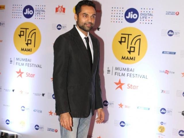 Abhay Deol posing for shutterbugs at the event. (IANS Photo)