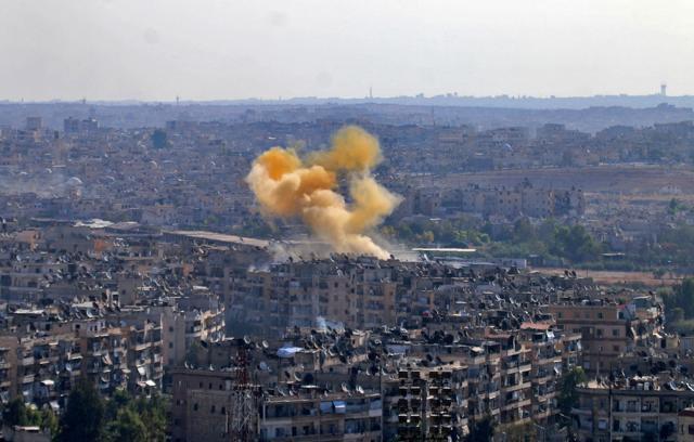 Smoke rises from reported opposition fire from buildings in an eastern government-held neighbourhood of the northern Syrian city of Aleppo. (AFP Photo) Smoke rises from reported opposition fire from buildings in an eastern government-held neighbourhood of the northern Syrian city of Aleppo. (AFP Photo)
