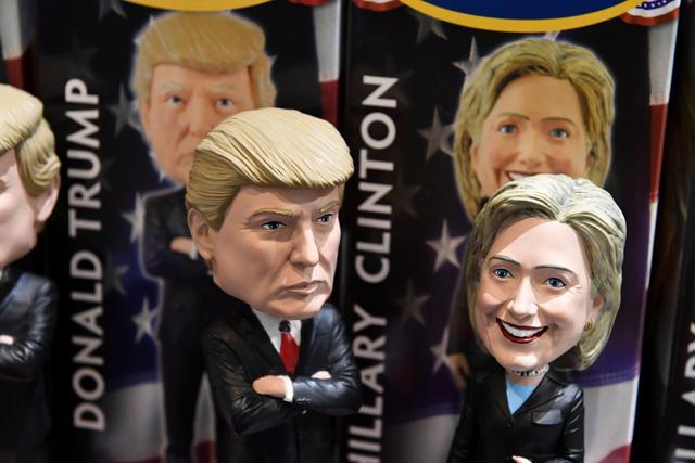 Bobblehead dolls of US Republican presidential nominee Donald Trump and Democratic presidential nominee Hillary Clinton are seen for sale in a gift shop at Philadelphia International Airport. (AFP Photo) Bobblehead dolls of US Republican presidential nominee Donald Trump and Democratic presidential nominee Hillary Clinton are seen for sale in a gift shop at Philadelphia International Airport. (AFP Photo)