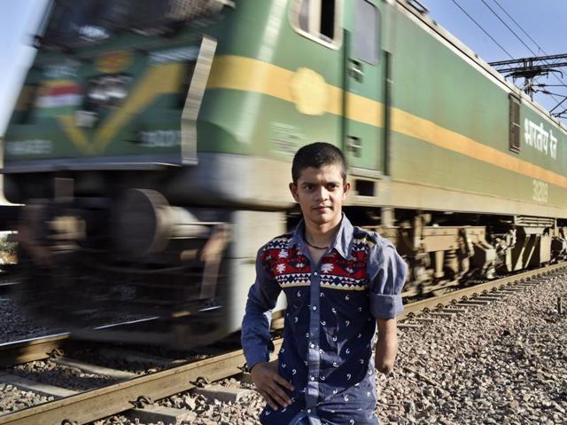 Ankit Rai poses near the spot where he lost his arm. In 2007, six-and-a-half-year old Ankit was kidnapped from a playground near his home. After a frantic search was launched for the missing boy, his kidnappers dumped him in the middle of two railway tracks, thinking he was dead. A speeding train ran over his arm. But Ankit survived. After gaining consciousness, Ankit lifted his amputated arm and somehow found his way home. The kidnappers who had demanded a ransom of Rs 7 lakh were caught later and turned out to be tenants in the family’s house. Ankit’s courage earned him the National Bravery Award in January 2008. (Sanjeev Verma/HT Photo)