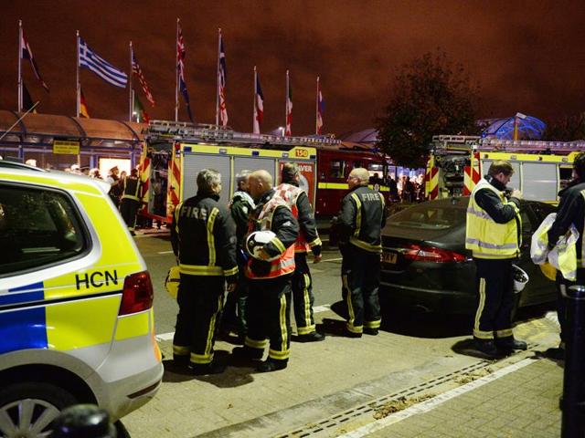 Emergency services outside London City Airport after people were evacuated after what the emergency services called a reported "chemical incident." on Friday. (AP) Emergency services outside London City Airport after people were evacuated after what the emergency services called a reported "chemical incident." on Friday. (AP)