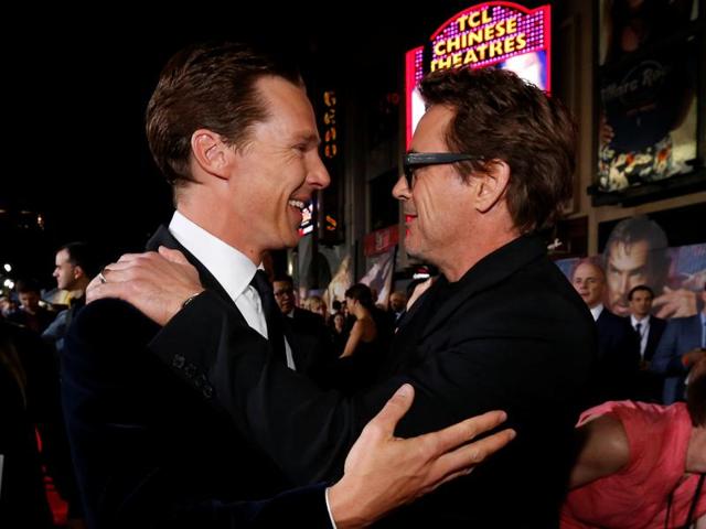 Doctor Strange star Benedict Cumberbatch and Iron Man actor Robert Downey Jr greet each other at the premiere of Doctor Strange in Hollywood, California. (REUTERS)