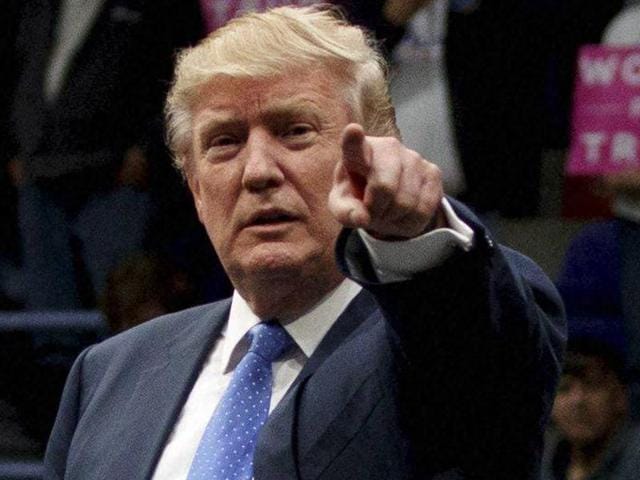Republican presidential candidate Donald Trump points to the crowd during a campaign rally on Friday.(AP) Republican presidential candidate Donald Trump points to the crowd during a campaign rally on Friday.(AP)