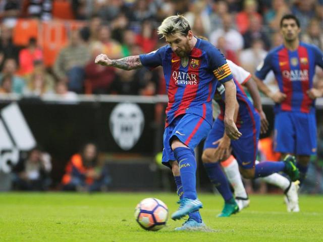Barcelona's Lionel Messi celebrates scoring his second goal. (REUTERS) Barcelona's Lionel Messi celebrates scoring his second goal. (REUTERS)