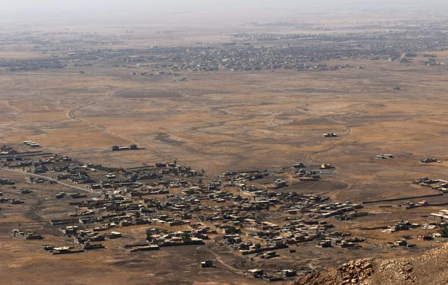 A picture taken from the top of Mount Zardak, shows the city of Nineveh. (AFP Photo) A picture taken from the top of Mount Zardak, shows the city of Nineveh. (AFP Photo)