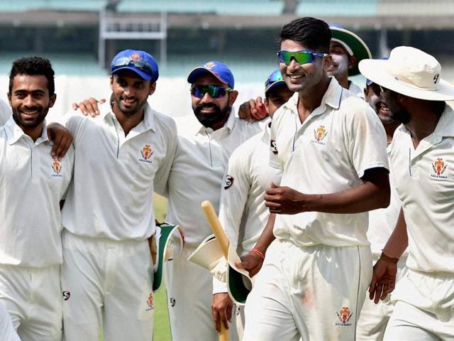 Karnataka team celebrate its win in the Ranji Trophy match against Delhi at Eden Gardens. (PTI Photo) Karnataka team celebrate its win in the Ranji Trophy match against Delhi at Eden Gardens. (PTI Photo)