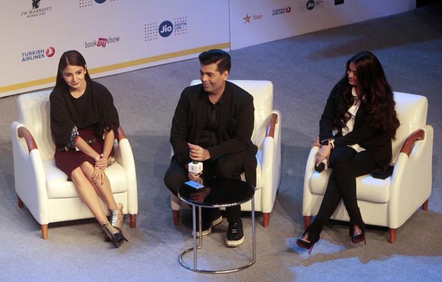 ‘Ae Dil Hai Mushkil’ actors Anushka Sharma (left) and Aishwarya Rai Bachchan (right) with director Karan Johar (centre) at the MAMI 18th Mumbai Film Festival in Mumbai. (AP Photo)