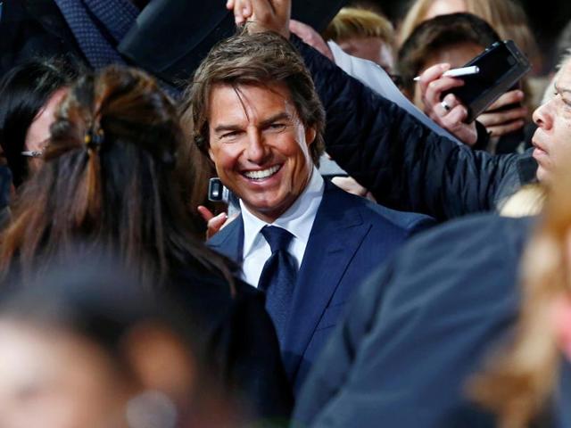 Spotted: Movie star Tom Cruise is greeted by fans at the premiere of his new film Jack Reacher: Never Go Back. (REUTERS)