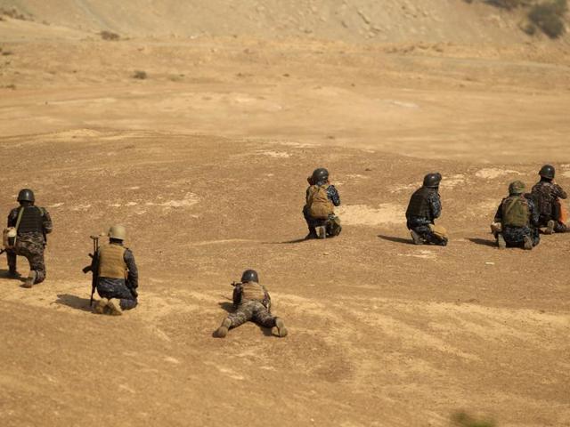 Members of Iraqi forces take position in front of Islamic States positions at the town of Safayah near Mosul, Iraq. (Reuters) Members of Iraqi forces take position in front of Islamic States positions at the town of Safayah near Mosul, Iraq. (Reuters)
