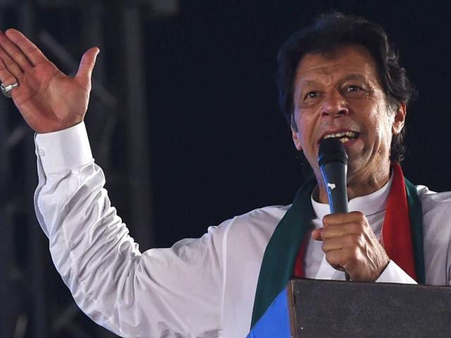 Pakistan's cricketer turn politician Imran Khan (centre) waves to his supporters at an anti-government rally in Lahore on September 30. (AP File) Pakistan's cricketer turn politician Imran Khan (centre) waves to his supporters at an anti-government rally in Lahore on September 30. (AP File)