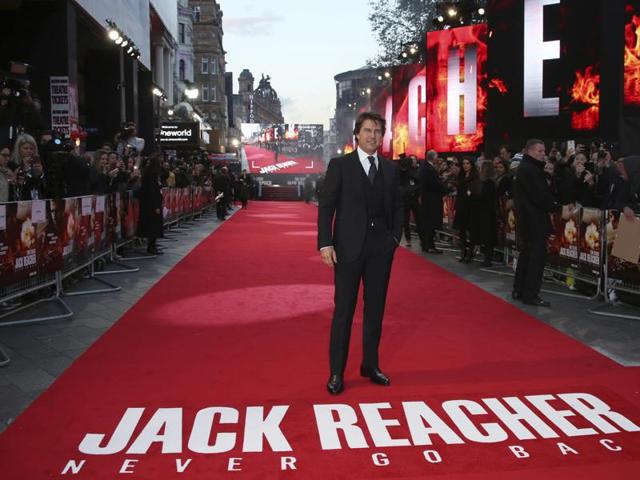 Tom Cruise poses for photographers upon arrival at the premiere of the film Jack Reacher: Never Go Back, in London. (AP)