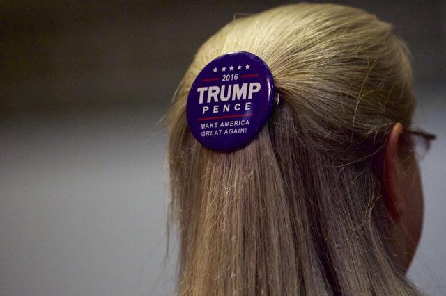A supporter wears a campaign pin in her hair before Republican Presidential nominee Donald J Trump holds an event at the Eisenhower Hotel and Conference Center on October 22 in Gettysburg, Pennsylvania. (AFP) A supporter wears a campaign pin in her hair before Republican Presidential nominee Donald J Trump holds an event at the Eisenhower Hotel and Conference Center on October 22 in Gettysburg, Pennsylvania. (AFP)