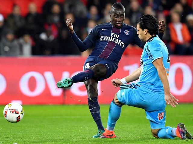 Paris Saint-Germain's Blaise Matuidi (L) kicks the ball as Olympique de Marseille's Karim Rekik looks to intercept. (AFP) Paris Saint-Germain's Blaise Matuidi (L) kicks the ball as Olympique de Marseille's Karim Rekik looks to intercept. (AFP)
