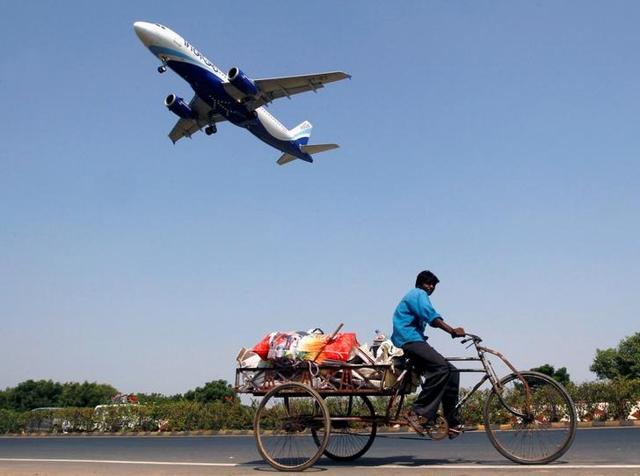 An IndiGo Airlines aircraft prepares to land in Ahmedabad, India, on October 26, 2015. Low-cost carriers like IndiGo and rival SpiceJet have helped grow India’s aviation industry. REUTERS/Amit Dave An IndiGo Airlines aircraft prepares to land in Ahmedabad, India, on October 26, 2015. Low-cost carriers like IndiGo and rival SpiceJet have helped grow India’s aviation industry. REUTERS/Amit Dave