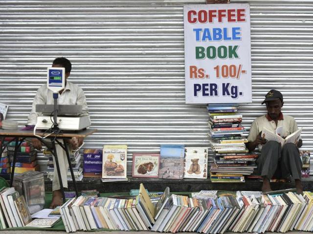 Coffee table books are sold at dirt cheap prices, making the Sunday bazaar a collectors’ paradise. (Vipin Kumar/HT PHOTO)