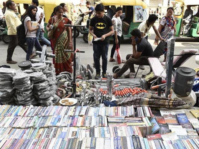 You can also find stuff you would never dream of looking for at a book bazaar -- cheap gym equipment, old coins, perfume bottles, and, if you’re interested, fuzzy bathroom slippers. (Vipin Kumar/HT PHOTO)