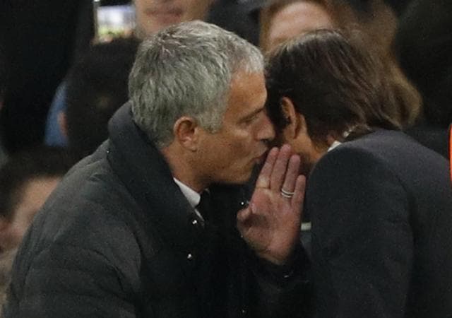 Mourinho whispers in Conte’s ear after the match. (REUTERS) Mourinho whispers in Conte’s ear after the match. (REUTERS)