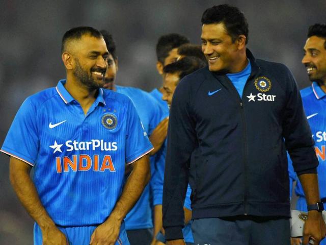 India captain Dhoni and coach Anil Kumble share a lighter moment during the post-match presentation ceremony. (PTI)