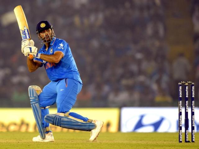 MS Dhoni watches his shot. (Keshav Singh/HT Photo)