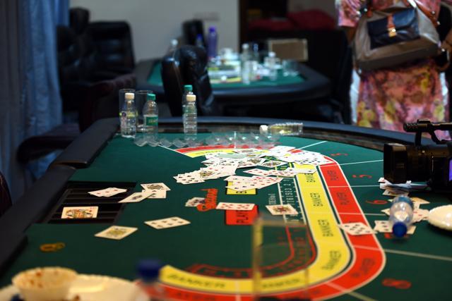 Gambling tables, 250 packets of playing cards and 23 bottles of liquor bottles were found in the farmhouse where an illegal casino was setup in Sainik Farms in New Delhi on Saturday. (Arun Sharma/HT Photo) Gambling tables, 250 packets of playing cards and 23 bottles of liquor bottles were found in the farmhouse where an illegal casino was setup in Sainik Farms in New Delhi on Saturday. (Arun Sharma/HT Photo)