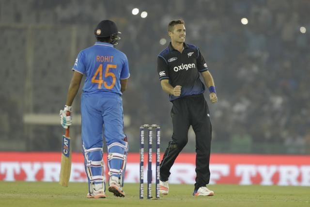 New Zealand's Tim Southee, right, celebrates the dismissal of Rohit Sharma. (AP) New Zealand's Tim Southee, right, celebrates the dismissal of Rohit Sharma. (AP)