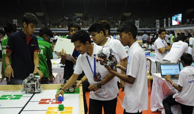 A team testing the skills of their creation at Netaji Indoor Stadium. Some of the 245 teams that participated will be selected for the Olympiad to be held in India in November. (Subhankar Chakraborty) A team testing the skills of their creation at Netaji Indoor Stadium. Some of the 245 teams that participated will be selected for the Olympiad to be held in India in November. (Subhankar Chakraborty)