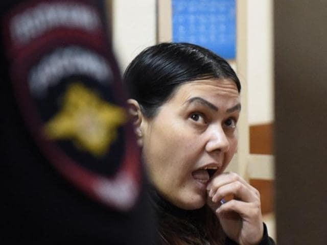 Gyulchekhra Bobokulova, a nanny suspected of killing a young girl in her care, reacts inside a defendants' cage during a hearing at a court in Moscow. (AFP File Photo) Gyulchekhra Bobokulova, a nanny suspected of killing a young girl in her care, reacts inside a defendants' cage during a hearing at a court in Moscow. (AFP File Photo)