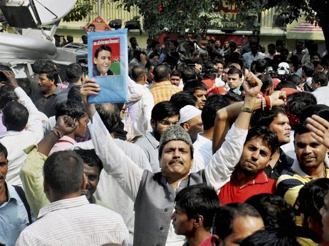 Supporters of Uttar Pradesh CM Akhilesh Yadav raise slogans at the party office where he was attending a meeting with party legislators along with SP supremo Mulayam Singh Yadav and party state president Shivpal Yadav, in Lucknow. (PTI Photo) Supporters of Uttar Pradesh CM Akhilesh Yadav raise slogans at the party office where he was attending a meeting with party legislators along with SP supremo Mulayam Singh Yadav and party state president Shivpal Yadav, in Lucknow. (PTI Photo)