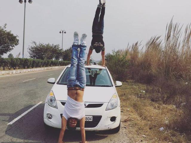 Hand-stand on the highway. Hand-stand on the highway.