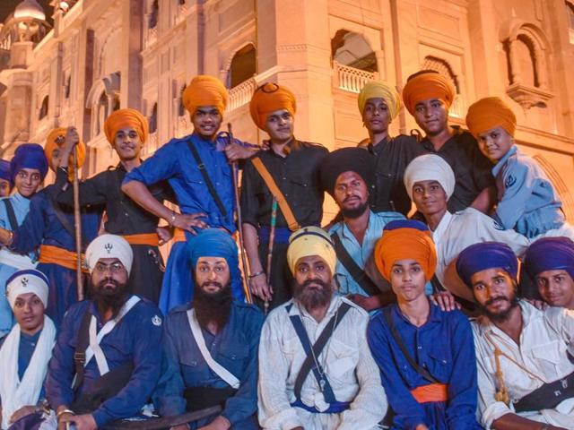 Gatka practitioners pose near the Golden Temple in Amritsar on Tuesday.(Gurpreet Singh/HT Photo) Gatka practitioners pose near the Golden Temple in Amritsar on Tuesday.(Gurpreet Singh/HT Photo)
