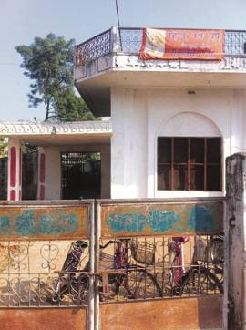 Wives of suspended cops at police colony in Baihar town.(HT photo)