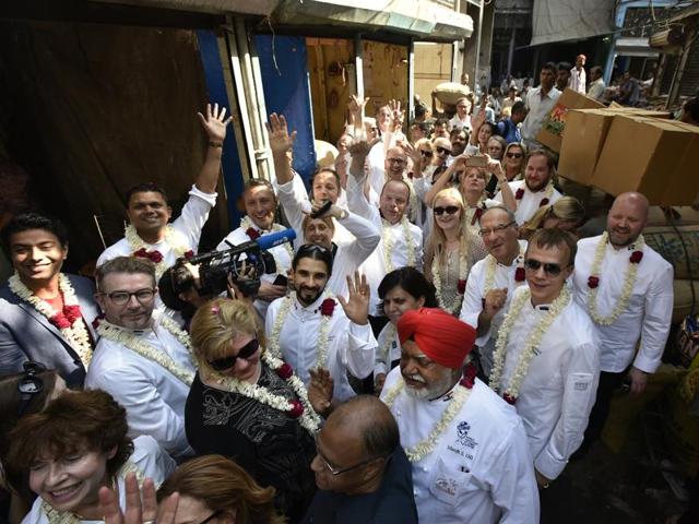 As they walked through the market, the men and women in Chef’s whites were happy to pose for group photographs.   (Ravi Choudhary/HT PHOTO) 