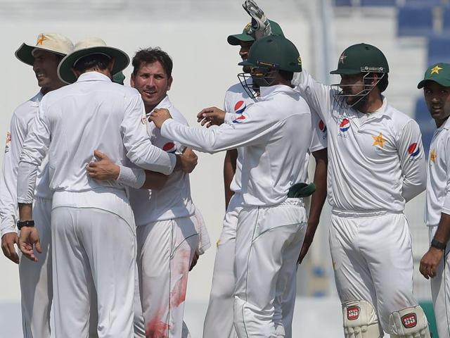 Yasir Shah (R) successfully appeals for a leg before decision against West Indies' captain Jason Holder (C).(AFP)