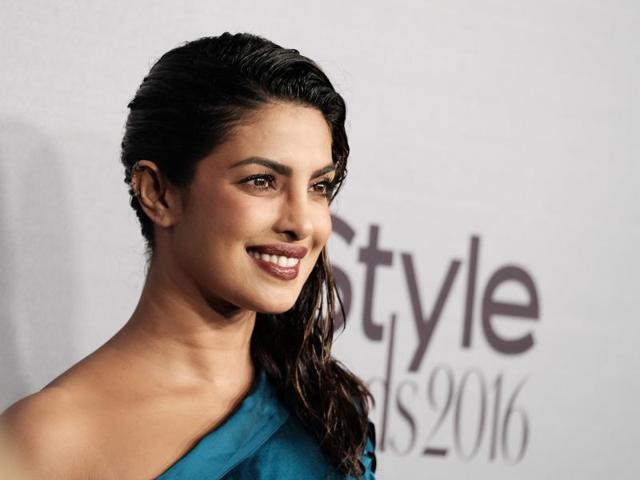 Actress Priyanka Chopra looked absolutely stunning in a one-shoulder satin teal top and a black skirt at Monday’s celebrity-packed 2016 InStyle Awards. (AFP) Actress Priyanka Chopra looked absolutely stunning in a one-shoulder satin teal top and a black skirt at Monday’s celebrity-packed 2016 InStyle Awards. (AFP)
