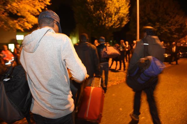 So-called "Jungle" migrants of Calais arrive at an orientation facility on October 24, 2016 in Nogent-le-Rotrou, France. (AFP Photo) So-called "Jungle" migrants of Calais arrive at an orientation facility on October 24, 2016 in Nogent-le-Rotrou, France. (AFP Photo)