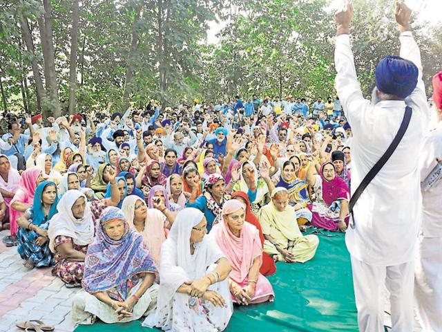 Villagers held a protest on Dasuya Road near the factory site on Monday in Dolowal; (below) the plywood plant is being set up by Century Plyboards (India) Ltd. (HT Photo) Villagers held a protest on Dasuya Road near the factory site on Monday in Dolowal; (below) the plywood plant is being set up by Century Plyboards (India) Ltd. (HT Photo)