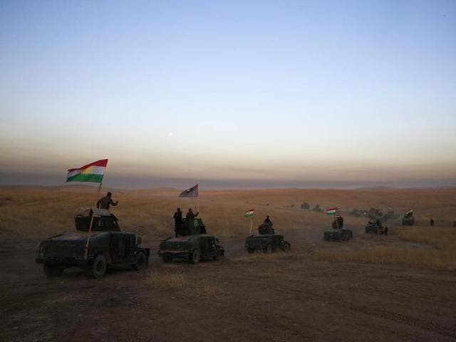 In this Oct 22, 2016 file photo, Iraq's elite counterterrorism forces patrol outside the town of Bartella, Iraq. In the week since Iraq launched an operation to retake Mosul from the Islamic State group, its forces have pushed toward the city from the north, east and south, battling the militants in a belt of mostly uninhabited towns and villages. (AP) In this Oct 22, 2016 file photo, Iraq's elite counterterrorism forces patrol outside the town of Bartella, Iraq. In the week since Iraq launched an operation to retake Mosul from the Islamic State group, its forces have pushed toward the city from the north, east and south, battling the militants in a belt of mostly uninhabited towns and villages. (AP)