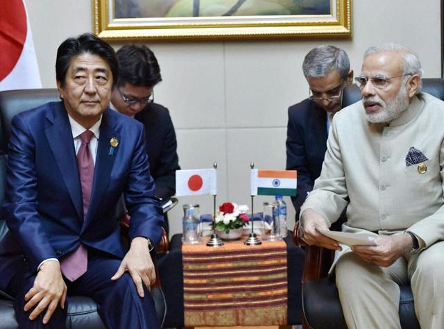 Vientiane: Prime Minister Narendra Modi with his Japanese counterpart Shinzo Abe during a bilateral meeting at 28th and 29th ASEAN Summit in Vientiane, Laos (PTI) Vientiane: Prime Minister Narendra Modi with his Japanese counterpart Shinzo Abe during a bilateral meeting at 28th and 29th ASEAN Summit in Vientiane, Laos (PTI)
